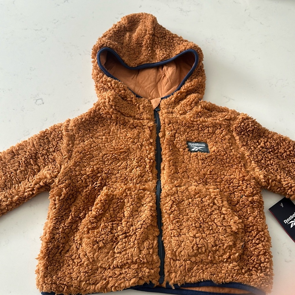Never worn kids Reebok Sweater